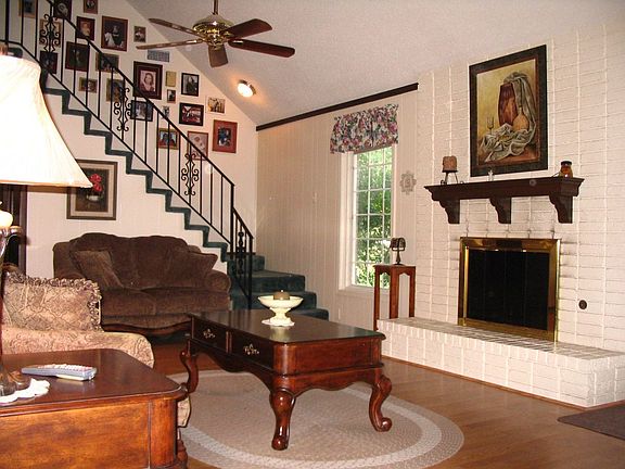 Secondary view of den to wide stairway