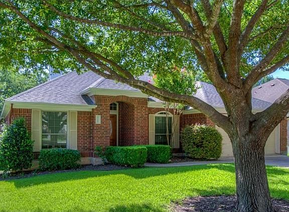 Welcome home to 2109 Smoke Tree Trail!