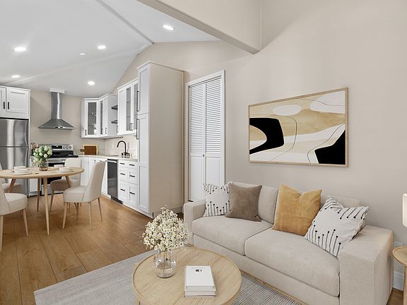 Bright living area with modern finishes and open layout (digitally staged). Please note photo is not to scale