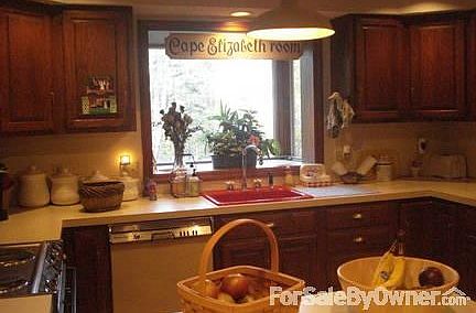 Kitchen
						:
						The cozy kitchen! Tons of cabinets