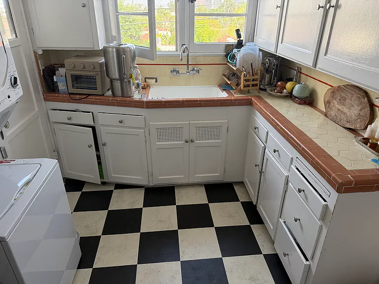 Original cabinets and countertops.
