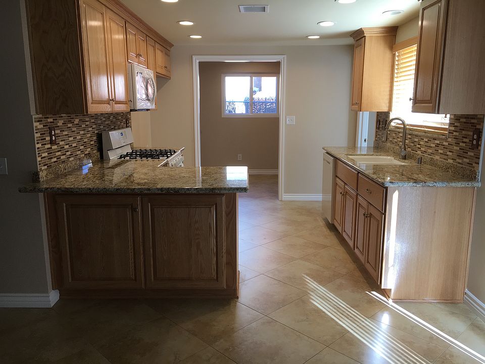 Custom cabinets with granite tops, all new appliances