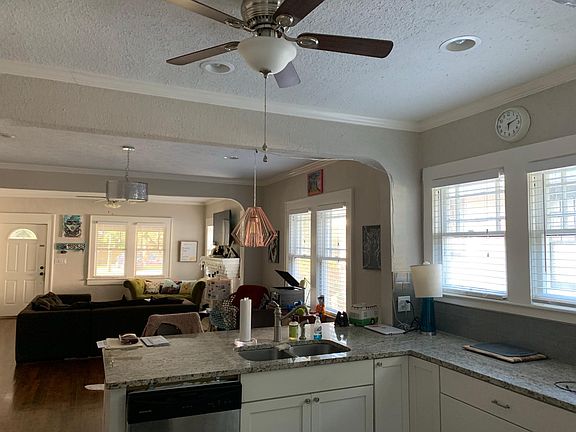 Kitchen looking into Dining and Living Room
