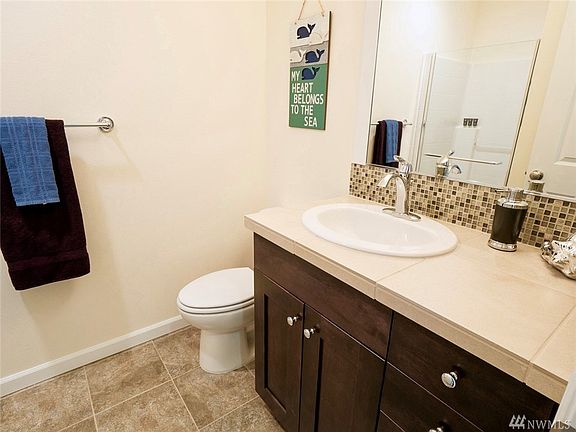 Spacious 3/4 bath downstairs.  Shower has never been used!