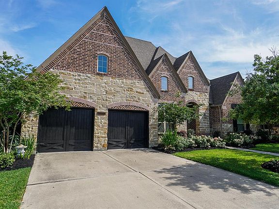 This home was built by Highland Homes and offers a 3 car tandem garage with epoxy floors, overhead storage and a totally floored attic for tons of storage space.