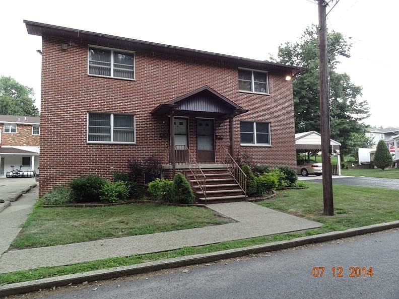 Front of house off street parking to left