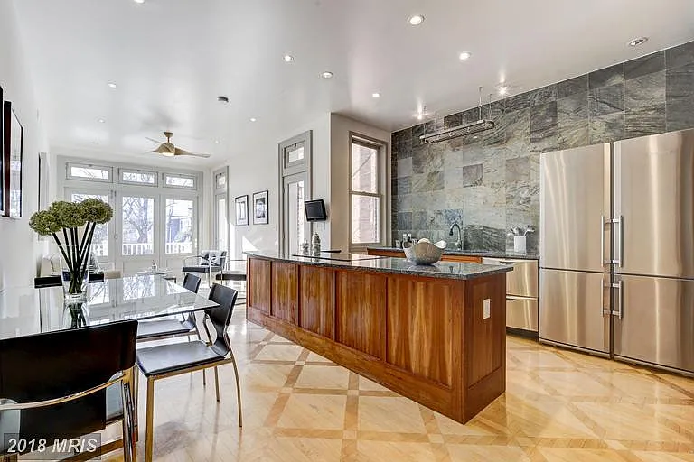 Modern kitchen with dual fridge and dual dishwashers