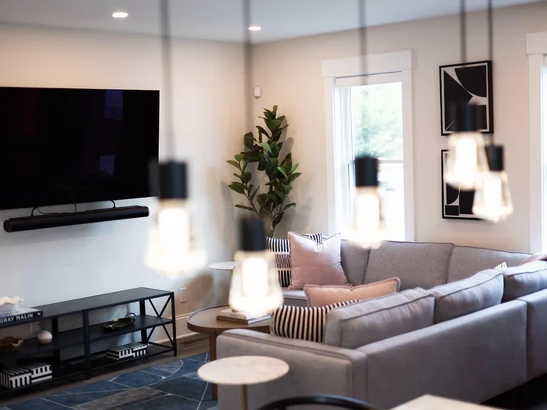 Step into this inviting living room and feel the stress of the day slip away! Minimalist chic at its best - your guests will love it! #minimallivingroom #relaxationmode #homevibes