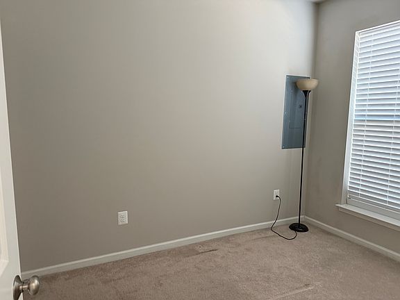 Entry-level bedroom with a full bathroom.