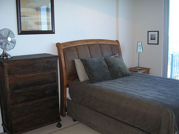 Bedroom w/ Floor-to-Ceiling Windows