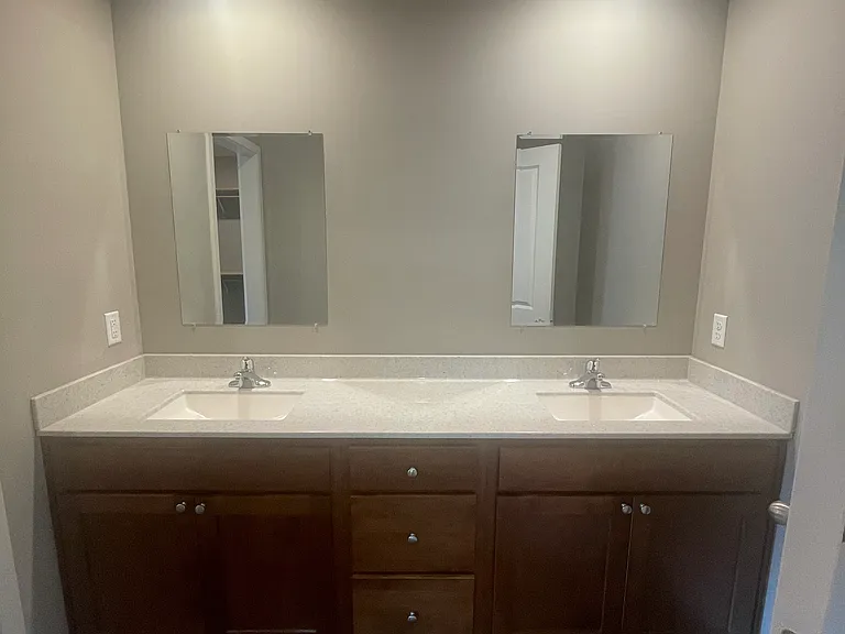Mather bathroom with double vanity