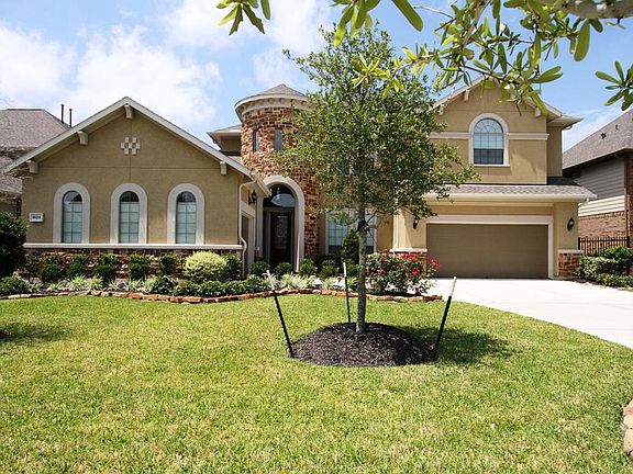 Another view of this gorgeous home on a lake front lot.