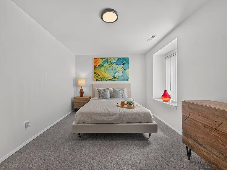 Spacious Bedroom with Ample storage at Lakeside Village Apartments in Clinton Township, MI