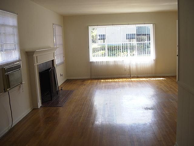 Living Room w/fireplace & picture wndow