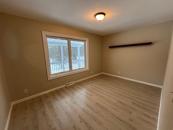First bedroom with closet on upper floor.