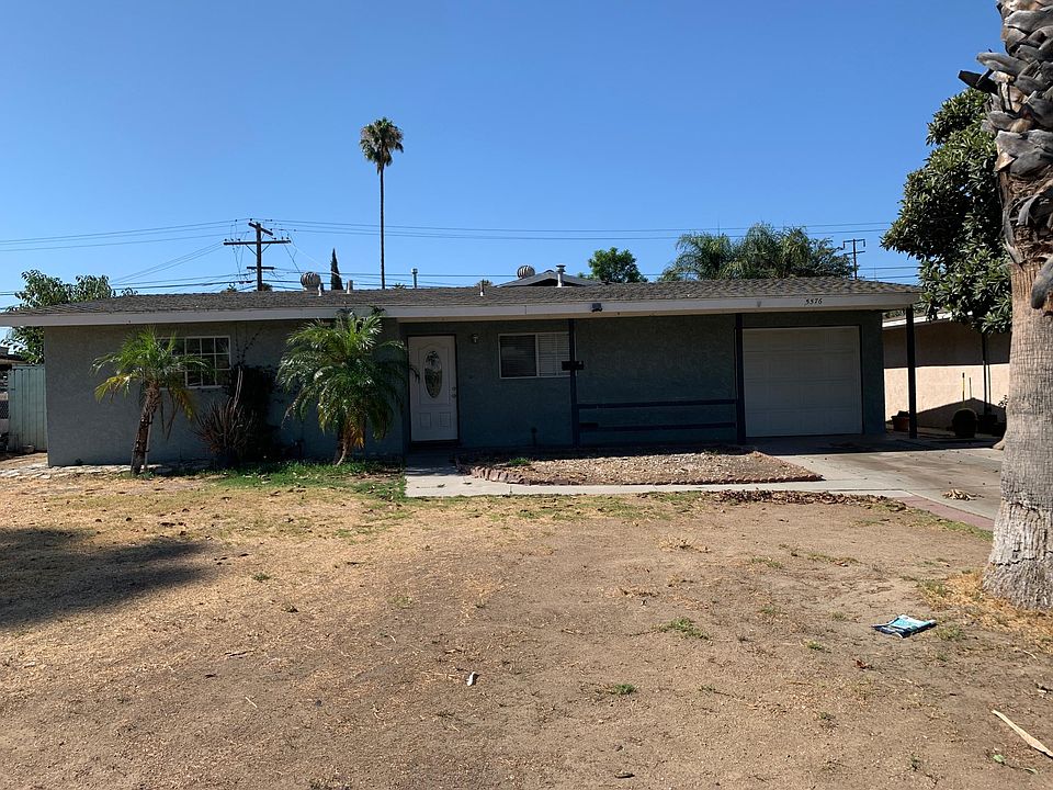 Home with single car attached garage. No maintenance yards