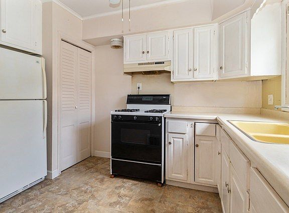 ~Clean white kitchen waiting for your special touch.