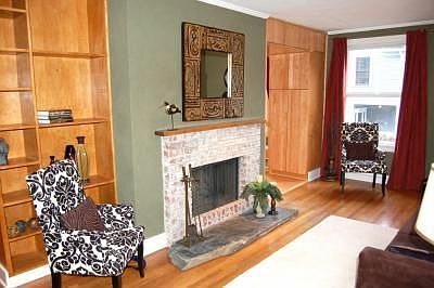Built in bookshelves & cabinetry in the living room.