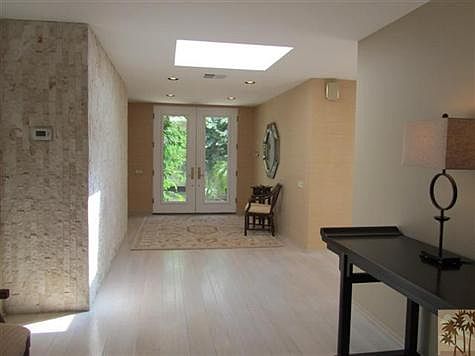 Formal entry.  Light wood flooring.