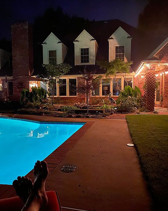 Koi pond adjacent to pool