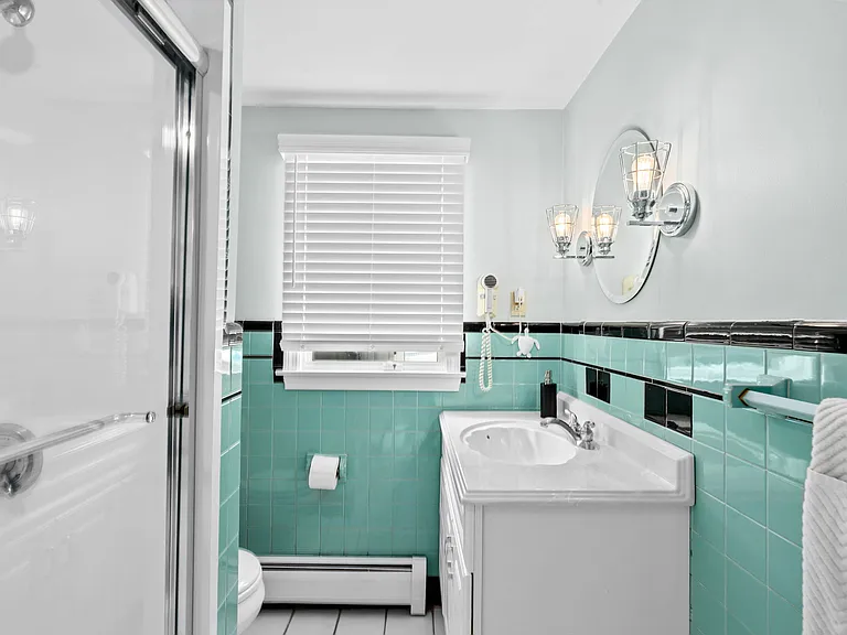 Full Bathroom with glass sliding doors