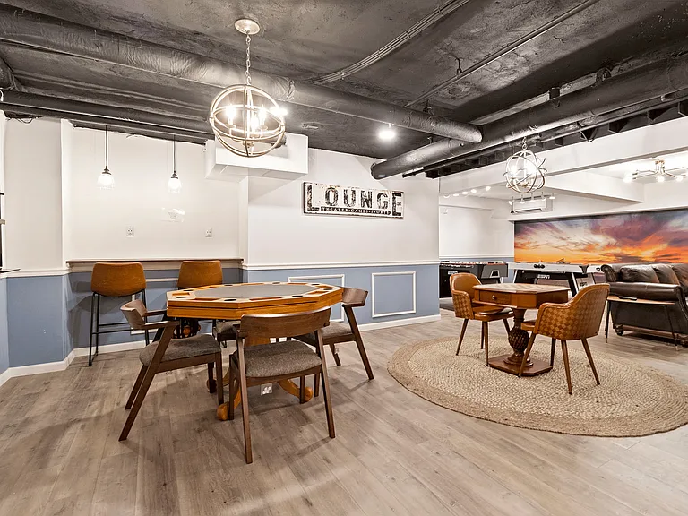 Relax and entertain in this inviting lounge, perfect for game nights and gatherings.