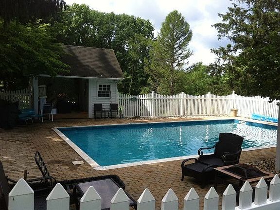 In Ground heated pool with cabana