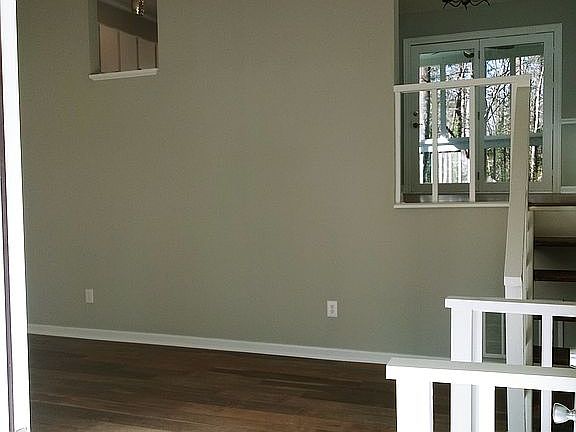 Living rm w/ cathedral ceiling