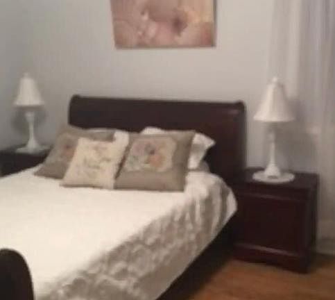 Main bedroom with adjoining half bath.