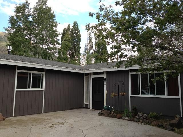 Front of house and entry from driveway. Off street parking up to three vehicles.