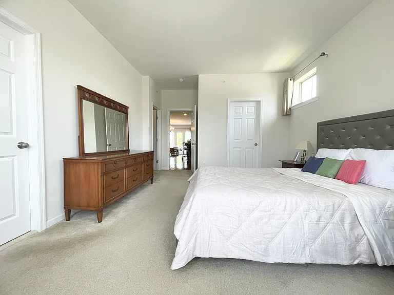 Master bedroom with two walking in closets