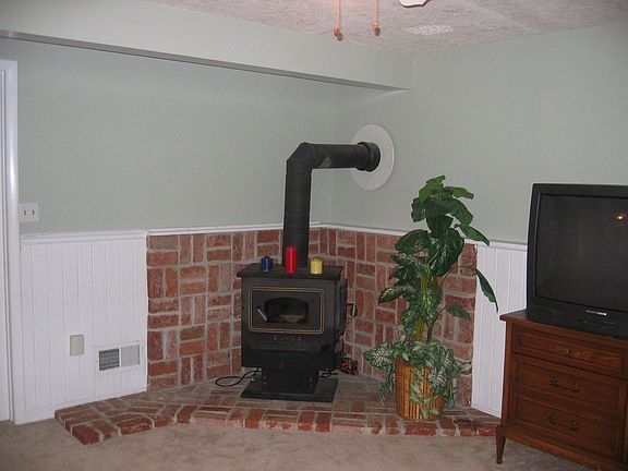 Lower level Family Room with wood stove