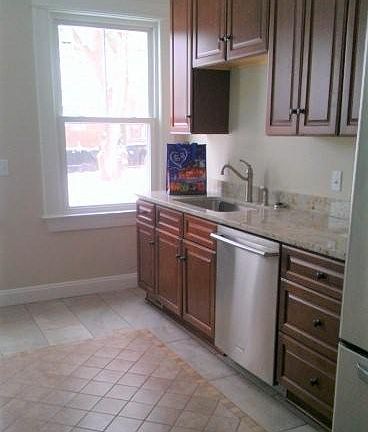 Fully updated kitchen with dishwasher and full size stainless bottom freezer refrigerator