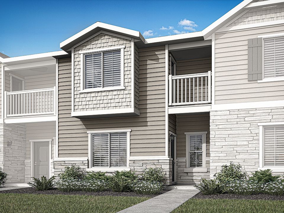 The Loveland is a beautiful two story townhome with siding and stone.
