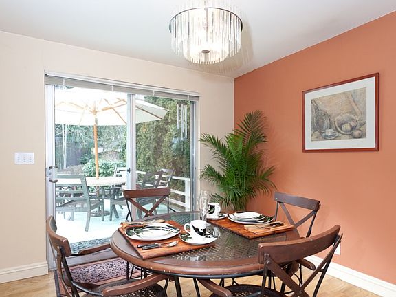 Generous dining area that opens to the entertainment sized multi level deck.