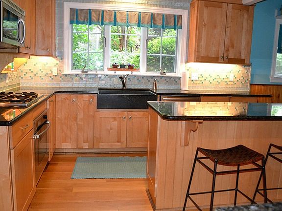 Renovated Kitchen : Granite Countertops Granite Island with Bar Stools 19 x 14