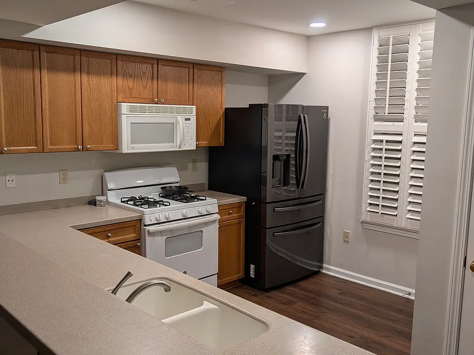 Full size kitchen with new dishwasher and large reach-in refrigerator/freezer