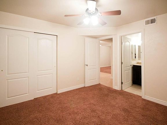 Master Bedroom view into Personal Bath and Living Room