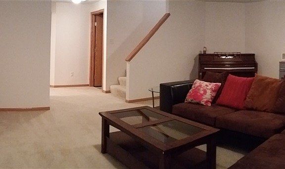 Lots of room for fun and games in the basement family room.