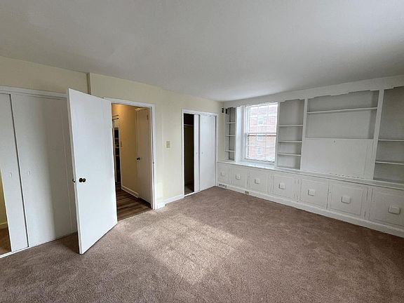 Second bedroom with large closets and built ins.