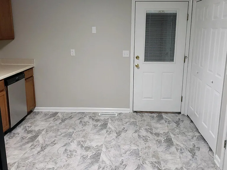 Unit 9 Laundry - Door Leading to Deck