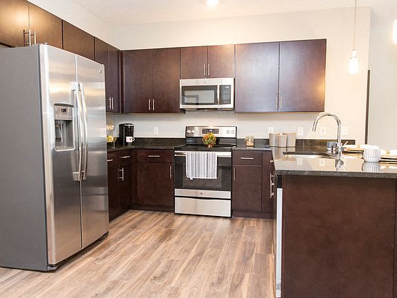 Enjoy preparing meals in your modern kitchen, designed for both functionality and style to enhance your daily routine.