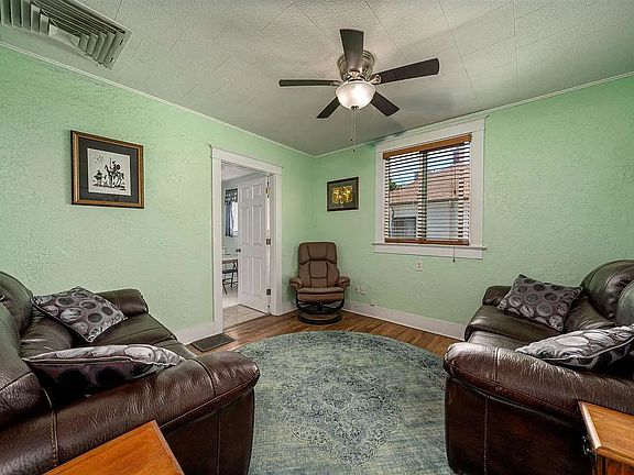 This room is used as bedroom now. There is a separate living room not pictured. All of these pictures are outdated and are from when the house was last listed for sale
