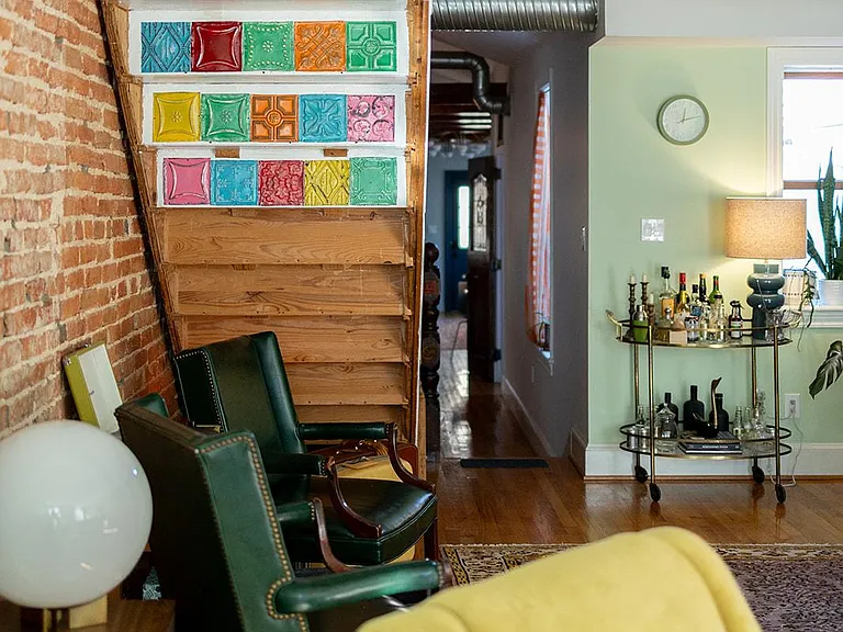 _____ Chill out and relax while listening to records on the turntable, grab a nip from the bar cart, or settle into your flow at the desk.