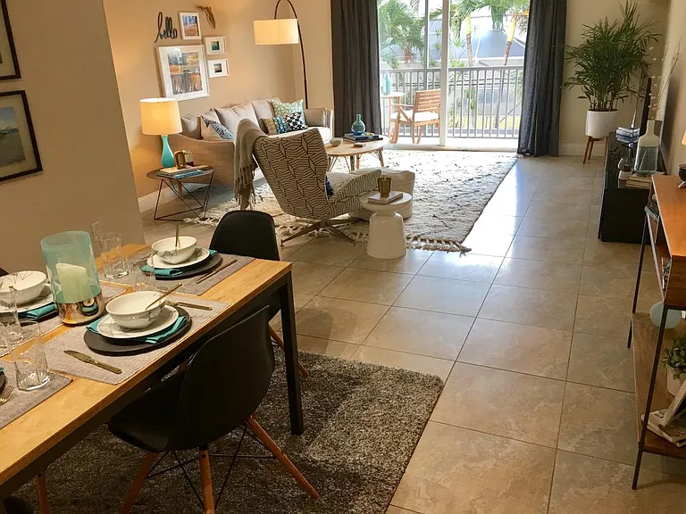 Beautiful tiled living room, this is a staged model unit, the unit available comes with all appliances but unfurnished