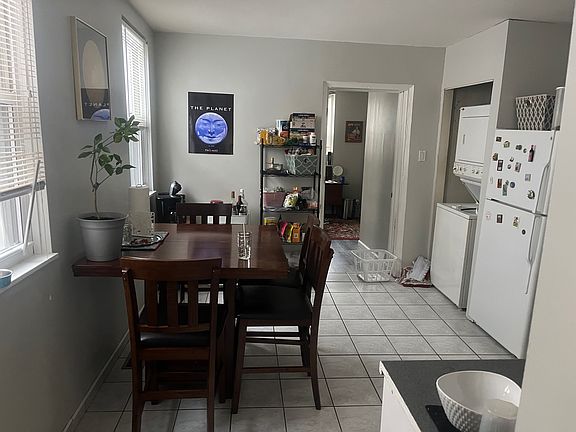 Laundry Center no longer in Kitchen. Has been Moved to second floor. Added more Cabinets/Counter space and Stainless Fridge.