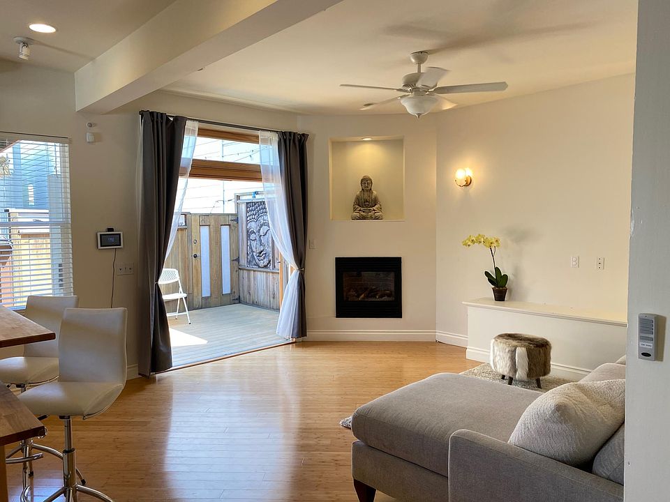 Open floorplan with french doors to private deck. Indoor outdoor living!