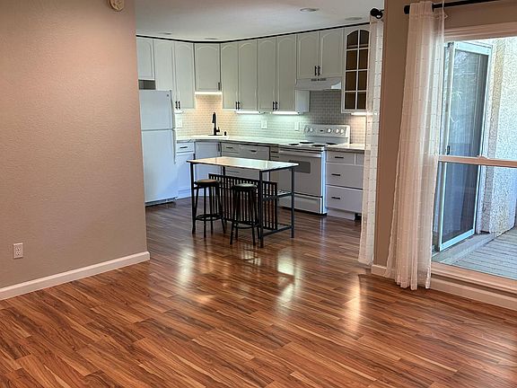 VIEW FROM LIVING AREA INTO KITCHEN