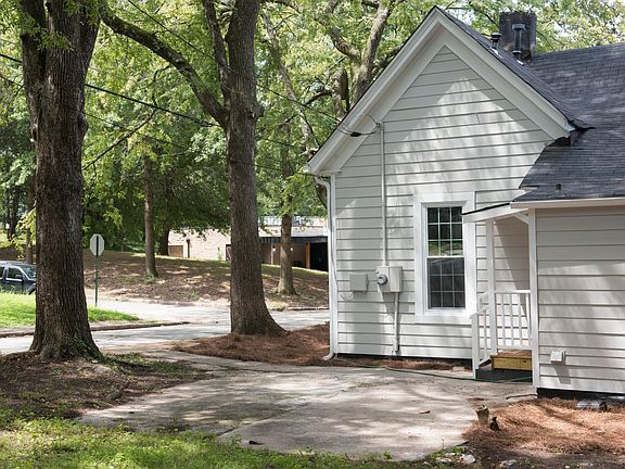 Backyard and paved patio now has 6 foot wood privacy fence and locking gate.