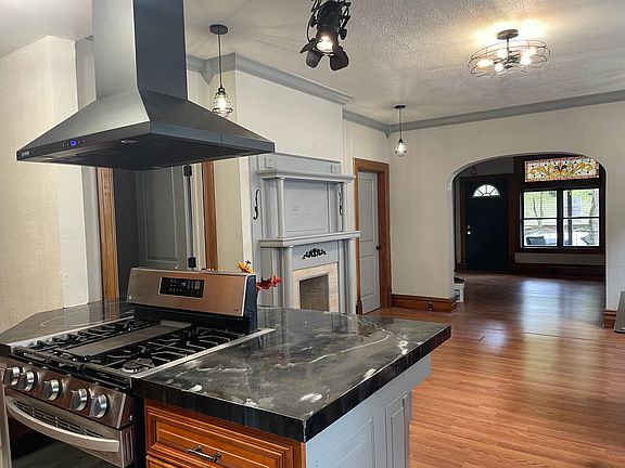 Kitchen, dining room and living room.